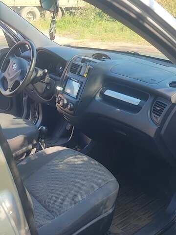 Сірий Кіа Sportage, об'ємом двигуна 1.98 л та пробігом 163 тис. км за 9400 $, фото 9 на Automoto.ua