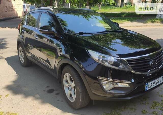 Сірий Кіа Sportage, об'ємом двигуна 2 л та пробігом 242 тис. км за 13799 $, фото 2 на Automoto.ua