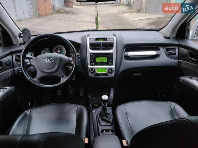 Серый Киа Sportage, объемом двигателя 1.99 л и пробегом 268 тыс. км за 8250 $, фото 11 на Automoto.ua