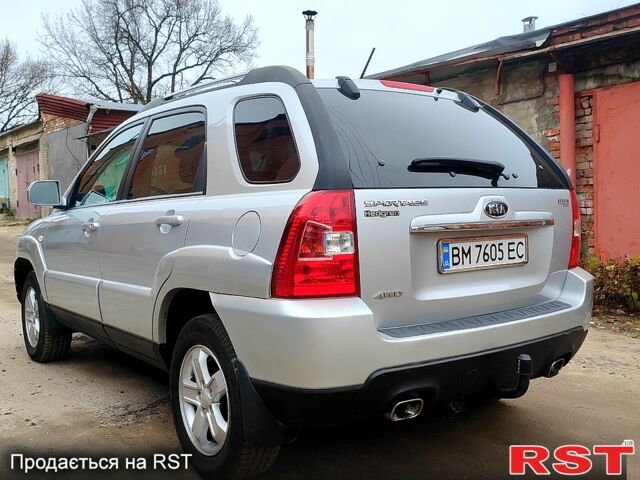 Серый Киа Sportage, объемом двигателя 2 л и пробегом 250 тыс. км за 8250 $, фото 2 на Automoto.ua