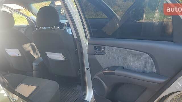 Сірий Кіа Sportage, об'ємом двигуна 1.98 л та пробігом 163 тис. км за 9400 $, фото 5 на Automoto.ua
