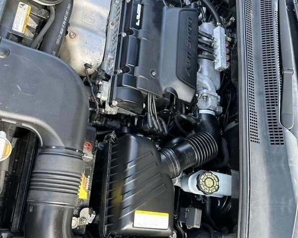 Серый Киа Sportage, объемом двигателя 2 л и пробегом 300 тыс. км за 8800 $, фото 28 на Automoto.ua