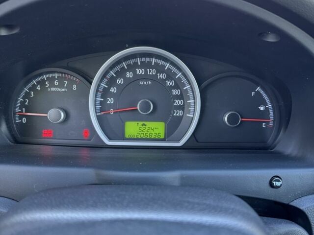 Серый Киа Sportage, объемом двигателя 2 л и пробегом 206 тыс. км за 8900 $, фото 12 на Automoto.ua