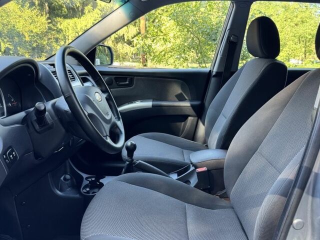 Серый Киа Sportage, объемом двигателя 2 л и пробегом 206 тыс. км за 8900 $, фото 8 на Automoto.ua