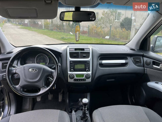 Серый Киа Sportage, объемом двигателя 1.99 л и пробегом 241 тыс. км за 8650 $, фото 18 на Automoto.ua