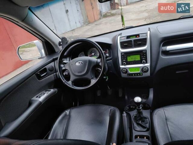 Серый Киа Sportage, объемом двигателя 1.99 л и пробегом 268 тыс. км за 8250 $, фото 6 на Automoto.ua