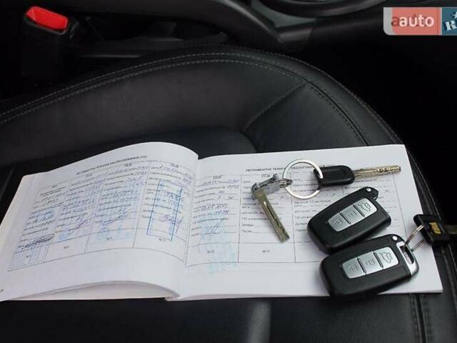 Серый Киа Sportage, объемом двигателя 2 л и пробегом 162 тыс. км за 12500 $, фото 2 на Automoto.ua