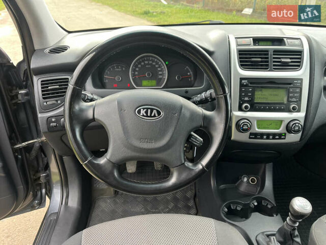 Серый Киа Sportage, объемом двигателя 1.99 л и пробегом 241 тыс. км за 8650 $, фото 17 на Automoto.ua