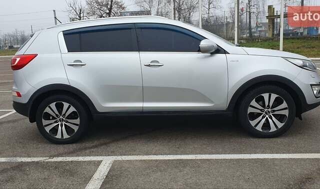 Серый Киа Sportage, объемом двигателя 2 л и пробегом 198 тыс. км за 13500 $, фото 4 на Automoto.ua
