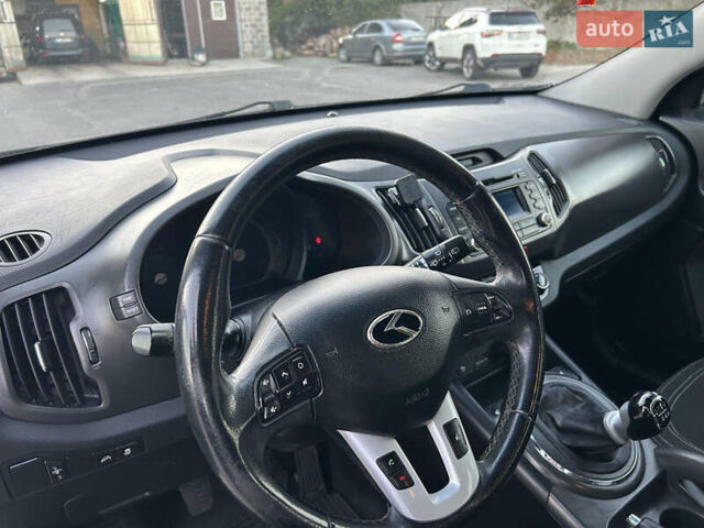Серый Киа Sportage, объемом двигателя 1.7 л и пробегом 231 тыс. км за 11500 $, фото 7 на Automoto.ua