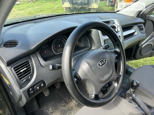 Сірий Кіа Sportage, об'ємом двигуна 2 л та пробігом 300 тис. км за 8400 $, фото 46 на Automoto.ua