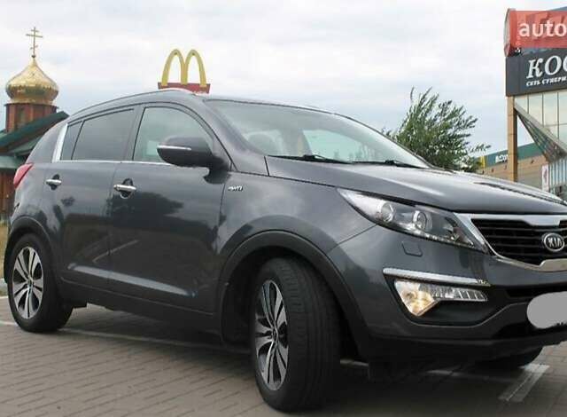 Серый Киа Sportage, объемом двигателя 2 л и пробегом 162 тыс. км за 12500 $, фото 5 на Automoto.ua
