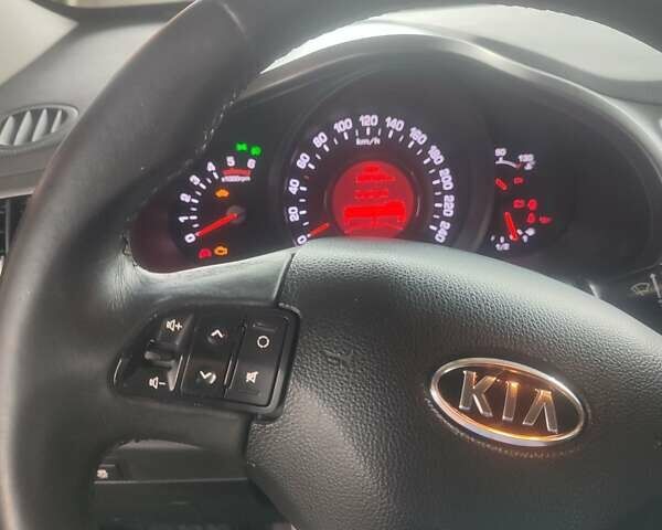 Серый Киа Sportage, объемом двигателя 2 л и пробегом 214 тыс. км за 12000 $, фото 4 на Automoto.ua
