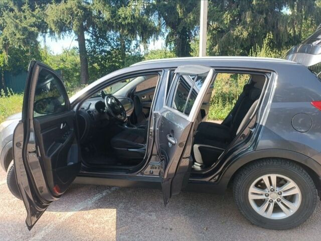Серый Киа Sportage, объемом двигателя 2 л и пробегом 225 тыс. км за 11000 $, фото 7 на Automoto.ua