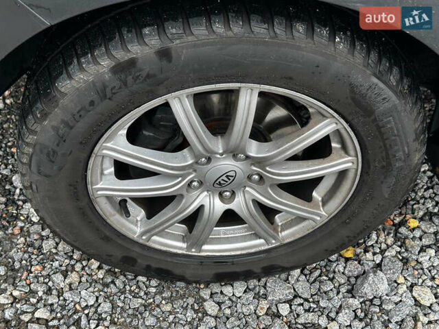 Серый Киа Sportage, объемом двигателя 2 л и пробегом 208 тыс. км за 12400 $, фото 9 на Automoto.ua