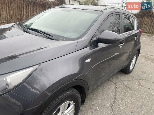 Серый Киа Sportage, объемом двигателя 2 л и пробегом 77 тыс. км за 12500 $, фото 23 на Automoto.ua