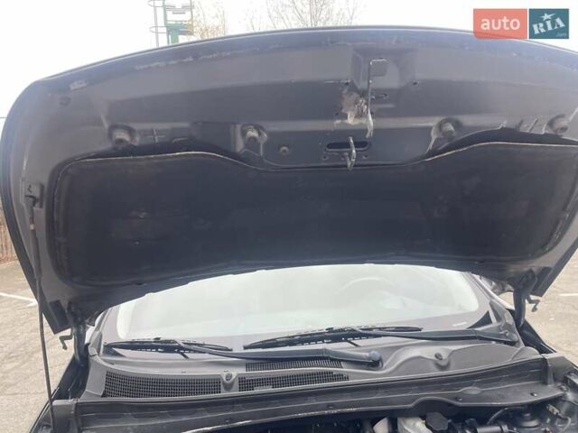 Серый Киа Sportage, объемом двигателя 2 л и пробегом 77 тыс. км за 12500 $, фото 30 на Automoto.ua