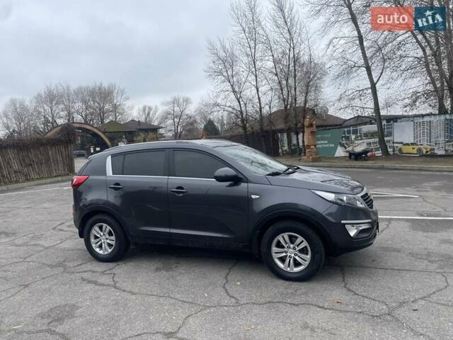 Серый Киа Sportage, объемом двигателя 2 л и пробегом 77 тыс. км за 12500 $, фото 3 на Automoto.ua