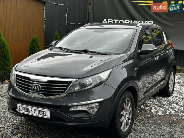 Серый Киа Sportage, объемом двигателя 2 л и пробегом 208 тыс. км за 12400 $, фото 1 на Automoto.ua