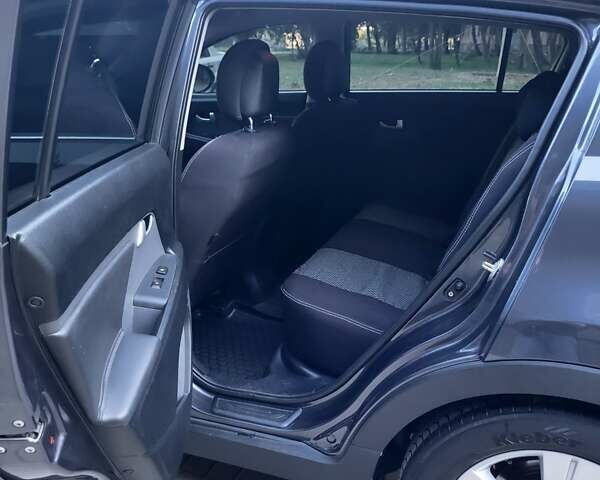 Сірий Кіа Sportage, об'ємом двигуна 2 л та пробігом 177 тис. км за 12000 $, фото 17 на Automoto.ua