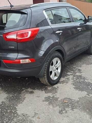 Серый Киа Sportage, объемом двигателя 2 л и пробегом 214 тыс. км за 12000 $, фото 7 на Automoto.ua
