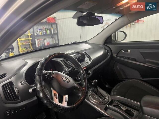 Серый Киа Sportage, объемом двигателя 2 л и пробегом 191 тыс. км за 10000 $, фото 10 на Automoto.ua