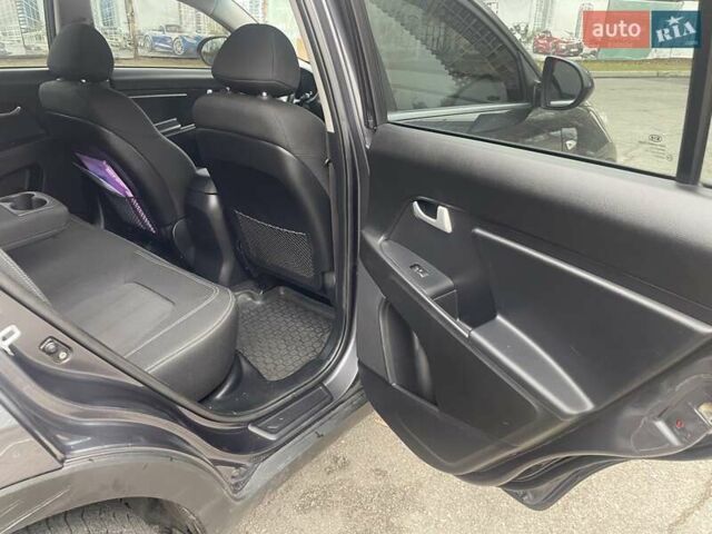 Серый Киа Sportage, объемом двигателя 2 л и пробегом 77 тыс. км за 12500 $, фото 17 на Automoto.ua