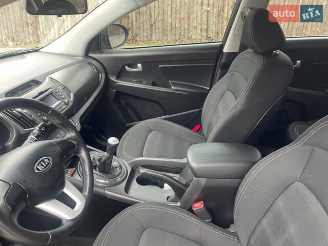 Серый Киа Sportage, объемом двигателя 2 л и пробегом 77 тыс. км за 12500 $, фото 9 на Automoto.ua