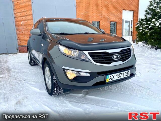 Серый Киа Sportage, объемом двигателя 2 л и пробегом 121 тыс. км за 12200 $, фото 1 на Automoto.ua