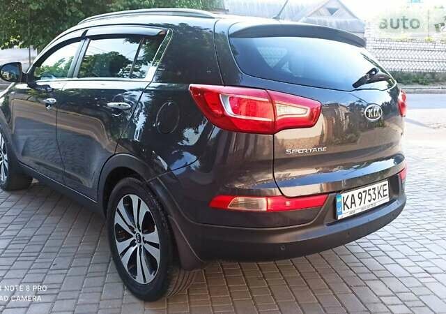 Серый Киа Sportage, объемом двигателя 2 л и пробегом 182 тыс. км за 13750 $, фото 4 на Automoto.ua