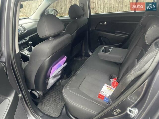 Серый Киа Sportage, объемом двигателя 2 л и пробегом 77 тыс. км за 12500 $, фото 10 на Automoto.ua