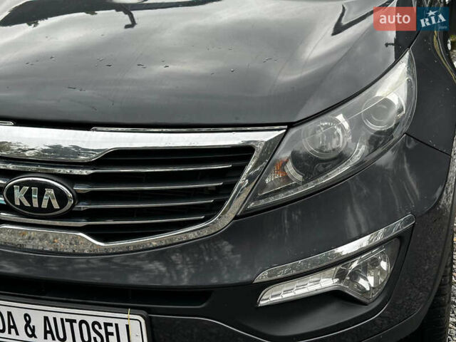 Серый Киа Sportage, объемом двигателя 2 л и пробегом 208 тыс. км за 11800 $, фото 8 на Automoto.ua