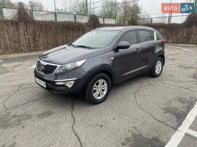 Серый Киа Sportage, объемом двигателя 2 л и пробегом 77 тыс. км за 12500 $, фото 1 на Automoto.ua