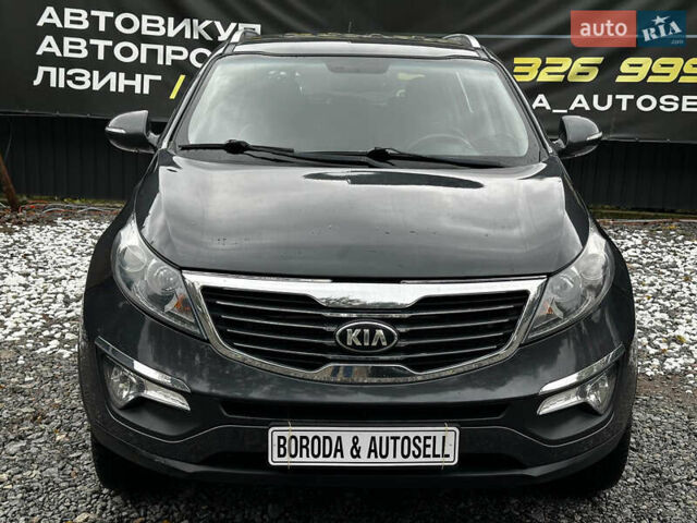 Серый Киа Sportage, объемом двигателя 2 л и пробегом 208 тыс. км за 11800 $, фото 1 на Automoto.ua