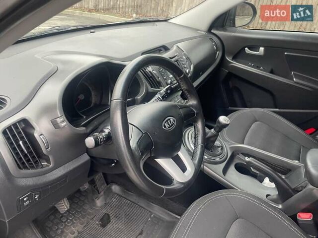 Серый Киа Sportage, объемом двигателя 2 л и пробегом 77 тыс. км за 12500 $, фото 8 на Automoto.ua