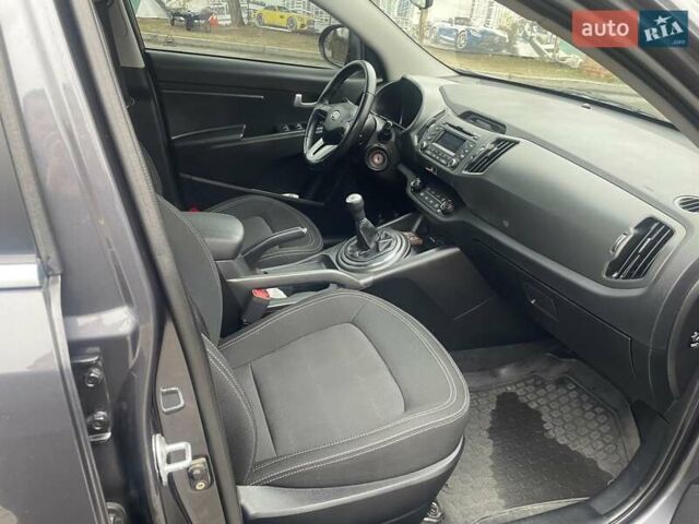 Серый Киа Sportage, объемом двигателя 2 л и пробегом 77 тыс. км за 12500 $, фото 19 на Automoto.ua