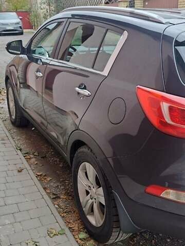 Серый Киа Sportage, объемом двигателя 2 л и пробегом 214 тыс. км за 12000 $, фото 8 на Automoto.ua