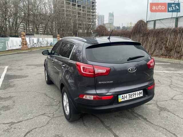 Серый Киа Sportage, объемом двигателя 2 л и пробегом 77 тыс. км за 12500 $, фото 6 на Automoto.ua