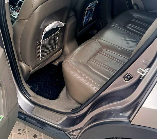 Серый Киа Sportage, объемом двигателя 2.4 л и пробегом 205 тыс. км за 11500 $, фото 6 на Automoto.ua