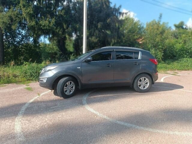 Серый Киа Sportage, объемом двигателя 2 л и пробегом 225 тыс. км за 11000 $, фото 2 на Automoto.ua