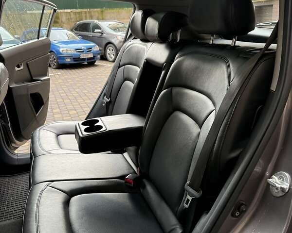 Сірий Кіа Sportage, об'ємом двигуна 2 л та пробігом 160 тис. км за 12300 $, фото 4 на Automoto.ua