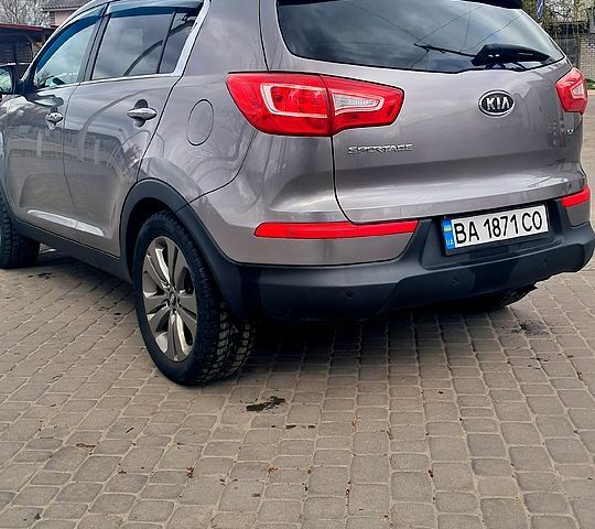 Серый Киа Sportage, объемом двигателя 2.4 л и пробегом 205 тыс. км за 11500 $, фото 1 на Automoto.ua