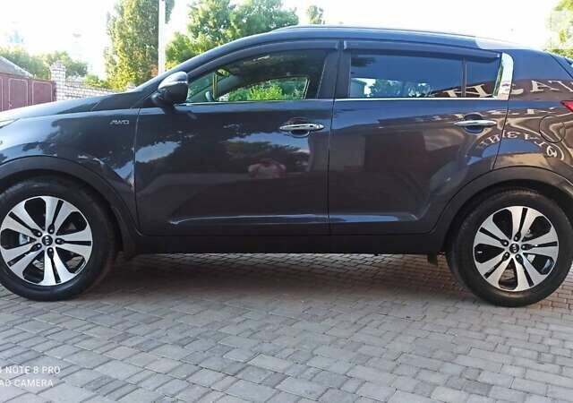 Серый Киа Sportage, объемом двигателя 2 л и пробегом 182 тыс. км за 13750 $, фото 6 на Automoto.ua