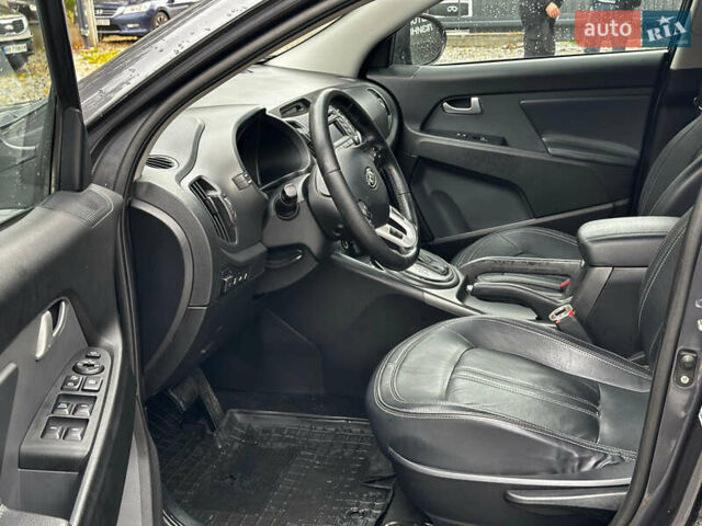 Серый Киа Sportage, объемом двигателя 2 л и пробегом 208 тыс. км за 12400 $, фото 13 на Automoto.ua