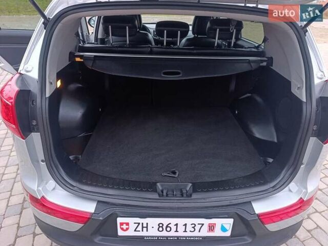 Серый Киа Sportage, объемом двигателя 2 л и пробегом 193 тыс. км за 14858 $, фото 27 на Automoto.ua