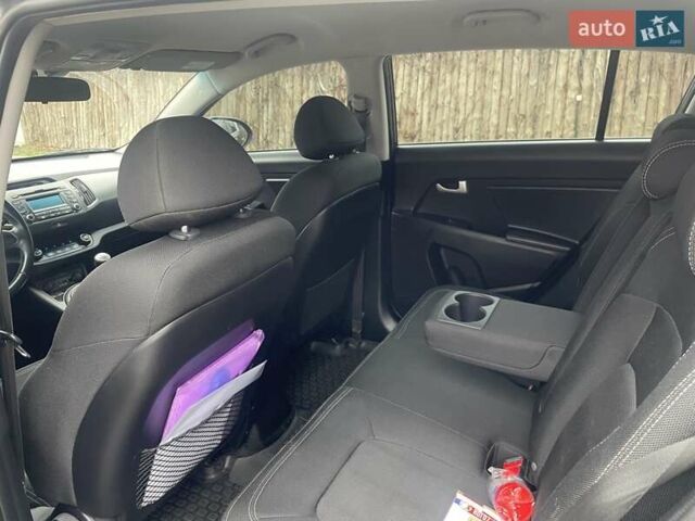 Серый Киа Sportage, объемом двигателя 2 л и пробегом 77 тыс. км за 12500 $, фото 12 на Automoto.ua