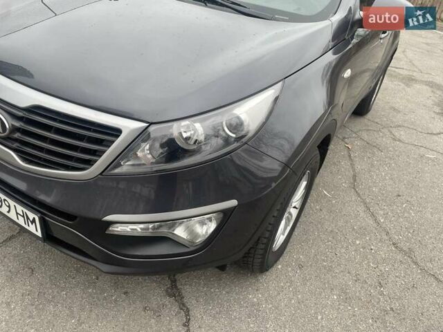 Серый Киа Sportage, объемом двигателя 2 л и пробегом 77 тыс. км за 12500 $, фото 22 на Automoto.ua