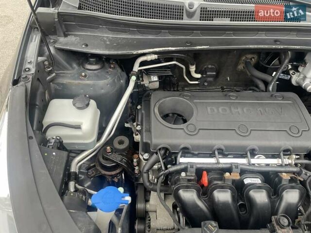 Серый Киа Sportage, объемом двигателя 2 л и пробегом 77 тыс. км за 12500 $, фото 25 на Automoto.ua