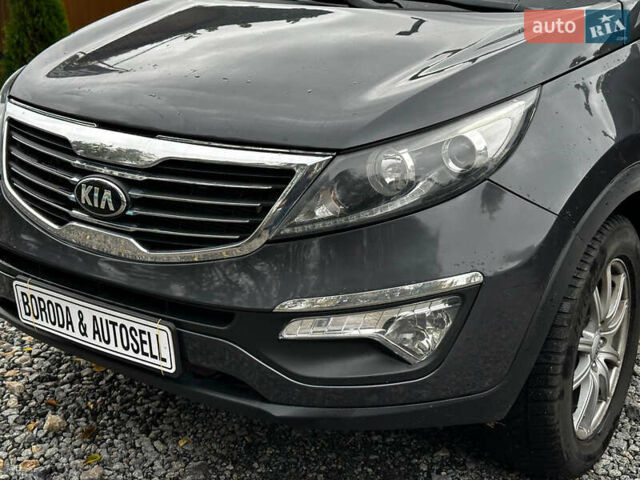 Серый Киа Sportage, объемом двигателя 2 л и пробегом 208 тыс. км за 11800 $, фото 5 на Automoto.ua