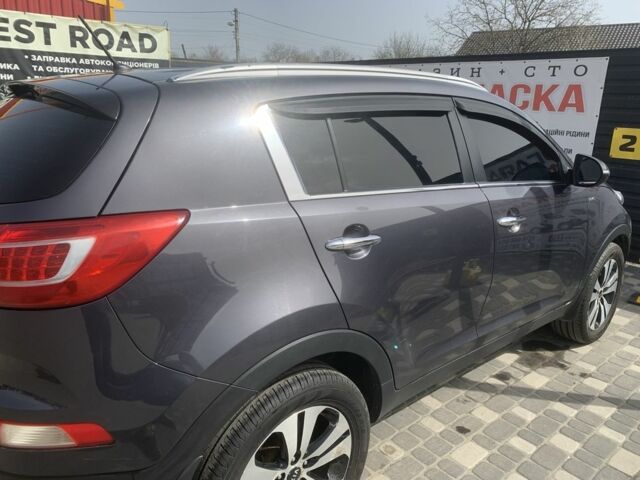 Серый Киа Sportage, объемом двигателя 2 л и пробегом 180 тыс. км за 12500 $, фото 4 на Automoto.ua